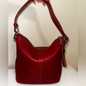 Coach leather satchel in red.  Excellent condition.